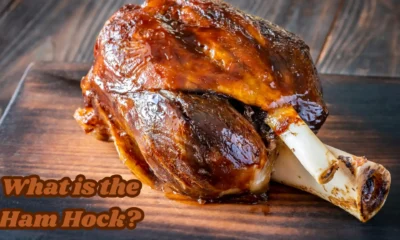 What is the Ham Hock? Ham hocks are meat segments from the lower third of the pig’s hind leg between the foot and the shank. This section has many connective tissues, thus making the meat hard; it must be cooked for long hours to become tender. Today, ham hocks come in fresh and cured types, but each is processed differently depending on the goal of the processors. If it is fresh, it has to be fully cooked as it contains raw meat; however, the cured ham hocks may also be smoked, enhancing the taste of the meat. This cut is prized for the meat’s ability to gain a flavoursome, intense, rich taste when cooked in soups, stew and broths. Historical and Cultural Background In the past, ham hocks have been essential in preparing different recipes globally. They have been indispensable in Southern cooking, particularly in relishes and side dishes of the soul food or comfort food categories such as collard greens, black-eyed peas, and pinto beans. The strong taste of ham hocks proved useful in making meals more appetising when meat cuttings were expensive. In Germany, eiswein uses ham hocks as their signature protein, while Poland commonly makes Golonka, a slow-cooked tender dish. Ham hocks are used in petit salé aux lentilles, a French cuisine where ham hocks are eaten with lentils. These cultural practices depict how ham hocks have adopted a lustrous place as part of the regional dishes because they enhance the food's flavour. Cook Ham Hocks Because of their texture, ham hocks are normally cooked by boiling, braising, or stewing to help release the flavours from the meat. When the ham hocks are placed in soups or stews and boiled gently for some time, it soaks the meat to tenderness and lets out all its flavour in the preparation. Ham hocks are most commonly served with such vegetables as collard greens, beans, or cabbage because these vegetables will soak up the smoky and salted ham hock flavour well. Another slow cooking method is brawn, where ham hocks are cooked slowly and covered in a little liquid to intensify the flavours and tenderise the food. Some recipes call for boiling cured and smoked ham hocks to draw out the salt and then roasting or incorporating them into other dishes. Nutritional Value of Ham Hocks Ham hocks are a good source of protein, important in the daily diet, especially when downed with beans, lentils or vegetables. Nevertheless, ham hocks are also rich sources of fat, particularly fat of the saturated kind, which comes from connective tissues and the layer of fat within them. Specifically, cured ham hocks contain a lot of sodium, so hypertensives and others on low-salt diets should limit their intake of this product. However, ham hocks are packed with essential nutrients and versatile carriers of taste in traditional foods. Popular Dishes Featuring Ham Hocks Ham hocks are the choicest in Southern U.S. food preparation and are utilised in many renowned recipes. They are often applied in collard greens; food stewed with a broth with the salty taste of ham hocks. Likewise, ham hocks tend to enrich black-eyed peas, a dish eaten during the New Year to bring luck. Pinto beans, another Southern dish, are cooked with ham hocks to make them thick and have a nitrate taste. Golonka – braised ham hocks, is a popular comfort food in Poland and internationally; eiswein, which is ham hocks served with sauerkraut, is common in Germany. Other French preparations involving petit salé include petit salé aux lentilles, where lentils and ham hocks are used to prepare the dish. Benefits and Flavor of Ham Hocks Ham hocks provide a long, rich, deeply imbued undertaste with slow-cooked or braised food preparations. Should one decide to incorporate it in the preparation of soups or stews, the liquid is improved by the exquisite flavour of the ham hocks, and when the meat is fully cooked, it becomes tender. The natural fats and connective tissue in ham hocks help create a velvety consistency in stews, while their smoky flavour complements many vegetables and legumes. Additionally, ham hocks are an economical choice for home cooks looking to enhance the taste of their meals without spending on pricier cuts of meat. Conclusion In conclusion, the ham hock is a versatile and flavorful pork cut with a history in various traditional cuisines. Whether used in Southern U.S. comfort food, European dishes, or other global recipes, ham hocks bring depth, richness, and smoky flavour to various meals. Although they require slow cooking to tenderise their tough meat, the results are well worth the effort, making them a staple ingredient for soups, stews, and braised dishes. Whether you're seeking to enhance your favourite comfort food or trying new international recipes, incorporating ham hocks into your cooking will add a delicious and hearty element to your meals.